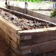 DIY Raised Bed Garden with Railroad Ties: Easy & Safe | The Ultimate Gardening Guide: Grow a Thriving Garden Year-Round