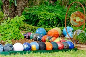 Garden Spheres: Decorating with Balls in Your Garden Oasis | The Ultimate Gardening Guide: Grow a Thriving Garden Year-Round